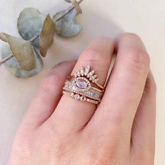 heirloom baguette diamond halfway band stacked with other liven rings