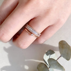 heirloom baguette diamond halfway band stacked with other liven rings