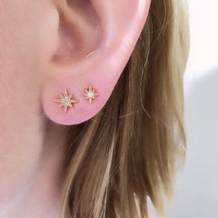starbust post earrings on ear