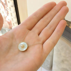 wheel of fortune necklace in mother of pearl