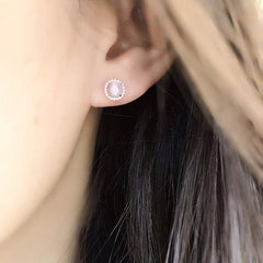 rosie rainbow moonstone earrings on ear