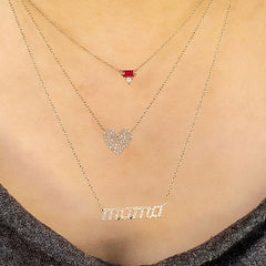 mama necklace layered with other liven pieces