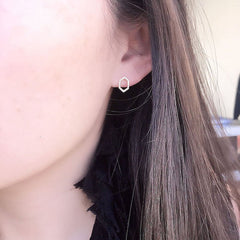 open hexagon post earrings on ear