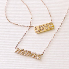 love and mama necklaces in solid 14k gold with conflict free diamonds