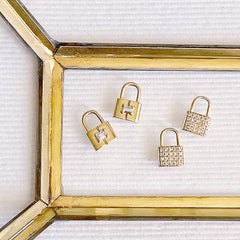 padlock charms in gold with diamonds