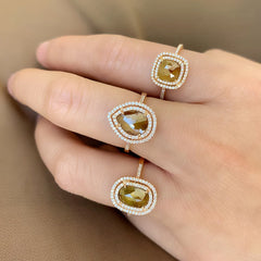 stunning one of a kind rose cut rustic diamond in a double halo of white diamonds set in rose gold