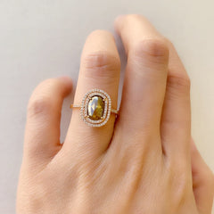 stunning one of a kind rose cut rustic diamond in a double halo of white diamonds set in rose gold