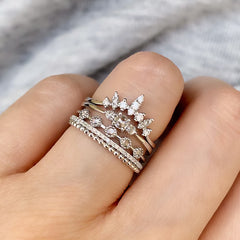 Beautiful stack of liven white gold and diamond rings