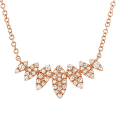multiple micropave diamond marquise shapes in a curved cluster in 14k gold