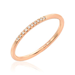 smooth, rounded hand pulled band with ten petite diamonds