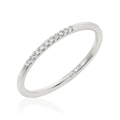 smooth, rounded hand pulled band with ten petite diamonds
