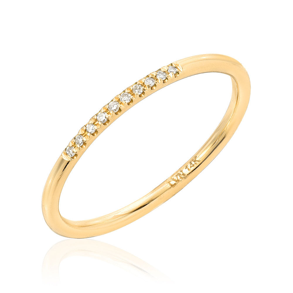 smooth, rounded hand pulled band with ten petite diamonds