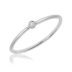 14k gold hand pulled wire band with single bezel set petite diamond