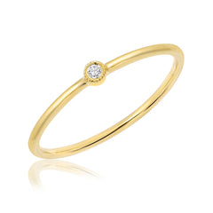 14k gold hand pulled wire band with single bezel set petite diamond