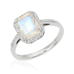 flat faced rainbow moonstone oblong in a sold 14k gold and diamond setting