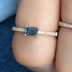 rose gold diamond band with emerald cut london blue topaz