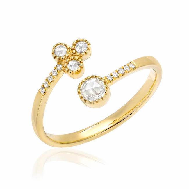 four rose cut diamond twist ring in yellow gold